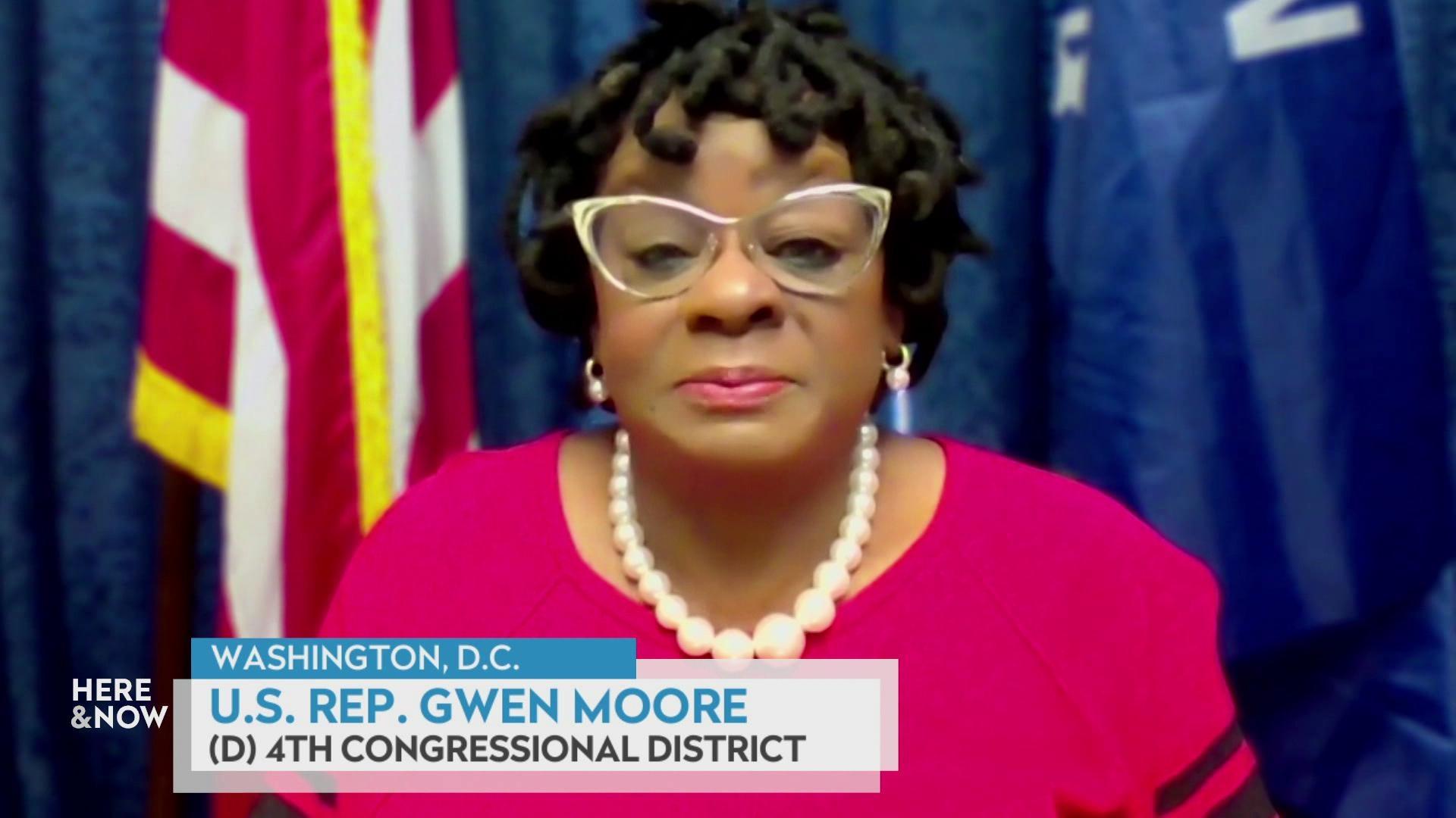A still image shows Gwen Moore seated in front of the Wisconsin and U.S. flag, with a caption at the bottom that reads 'Washington, D.C.,' 'U.S. Rep. Gwen Moore' and '(D) 4th congressional district.'