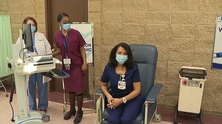 Video thumbnail: NJ Spotlight News Newark ER nurse gets NJ's very first COVID-19 vaccination