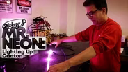 Mr. Neon Keeps Signs Glowing in Canton