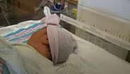 NJ's collection of baby bloodspots draws lawsuit