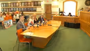 Pending bag tax veto hailed at hearing on plastic waste