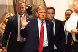 Hush money trial judge considers if Trump violated gag order