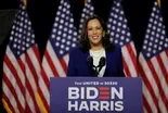 On a quiet stage, Biden welcomes Harris to campaign trail