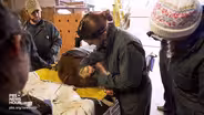 To heal scorched bear paws, vets craft a bio bandage