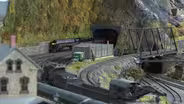 Model train exhibit scales down big locomotives