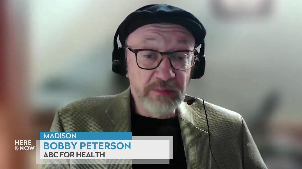 A still image from a video shows Bobby Peterson seated in front of a blurred background with a graphic at bottom reading 'Madison,' 'Bobby Peterson' and 'ABC for Health.'