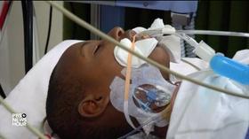 Video thumbnail: PBS NewsHour How a surgical team in Rwanda chooses which patients to save