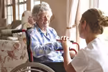 Why these caregivers call their jobs 'indentured servitude'