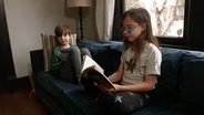 Older Sibling Reading to Younger Sibling | Learning to Read