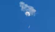 News Wrap: Navy searches for debris from Chinese balloon
