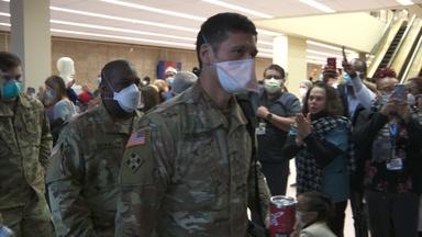 Arriving military medical team cheered at Newark hospital