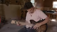 Teen builds custom guitars from scratch