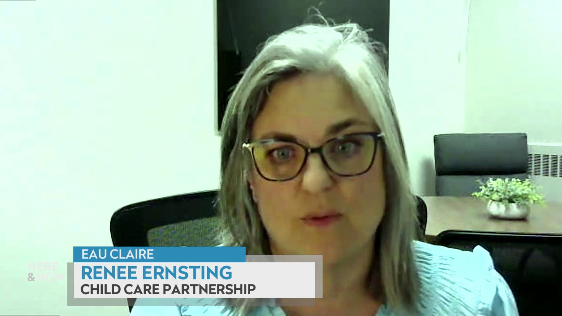A still image from a video shows Renee Ernsting in front of a table and TV with a graphic at bottom reading 'Eau Claire,' 'Renee Ernsting' and 'Child Care Partnership.'