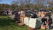 Families in Essex County line up to receive boxes of food