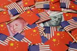 News Wrap: U.S., China exchange new threats on trade