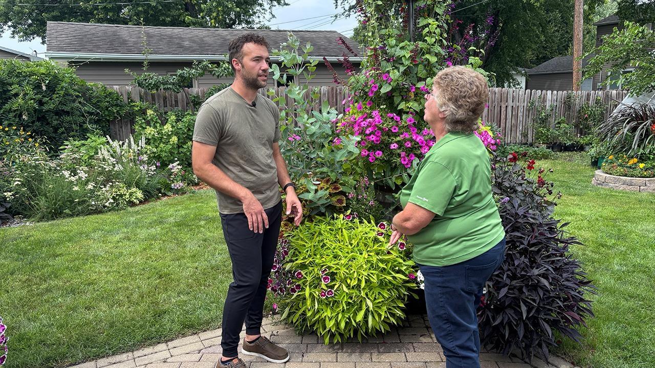 Charles Elhard is a devoted plant enthusiast, meticulously tending his vast, vibrant collections.