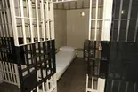 Reporter uses background to highlight prison conditions