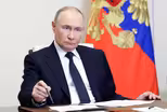 News Wrap: Trump says Putin vows to respond to drone attack