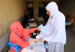 Afghans vote amid violence and alleged irregularities