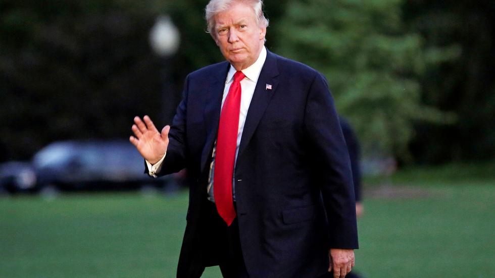 Trump legal team distances president from son's meeting image