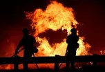 California crews race against the clock to contain fires