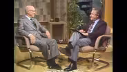 In Person: Dr. Milton S. Eisenhower & Howard K. Smith
