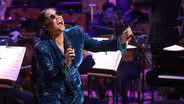 H.E.R. Performs "Make It Rain"