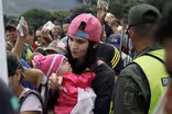 Scarcity and crisis drive Venezuelans to flee