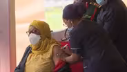 African nations struggle with vaccine access, disinformation
