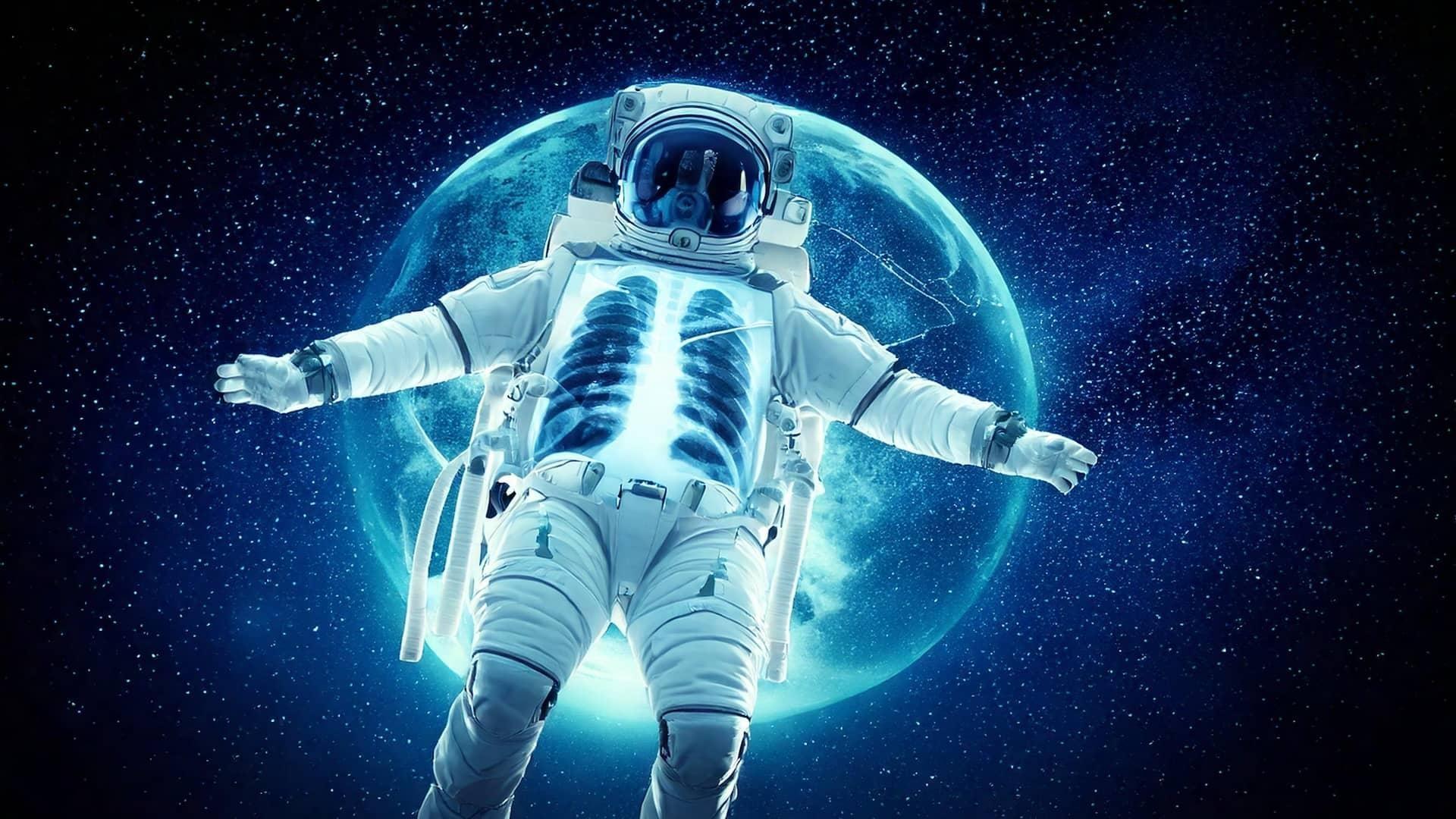 An astronaut in a space suit in front of a glowing planet.