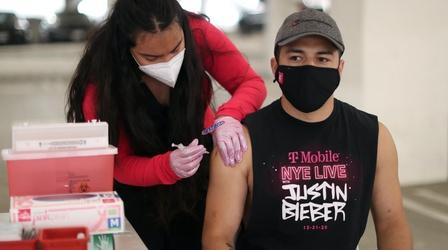 Video thumbnail: PBS NewsHour News Wrap: Half of U.S. adults got at least one COVID shot