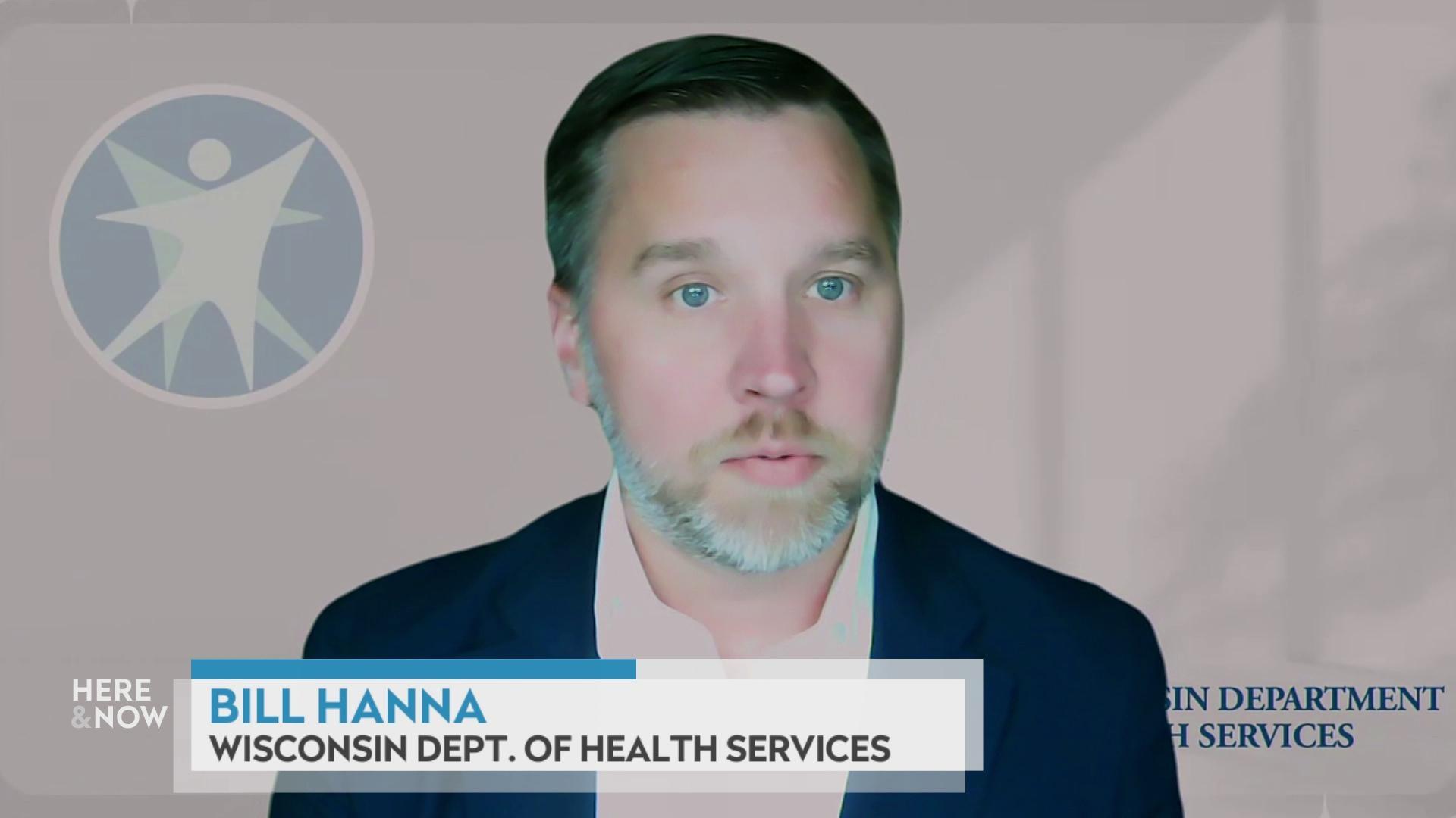 A still image shows Bill Hanna seated in front of a graphic of the Wisconsin Department of Health Services logo with a graphic at the bottom that reads 'Bill Hanna' and 'Wisconsin Dept. of Health Services.'