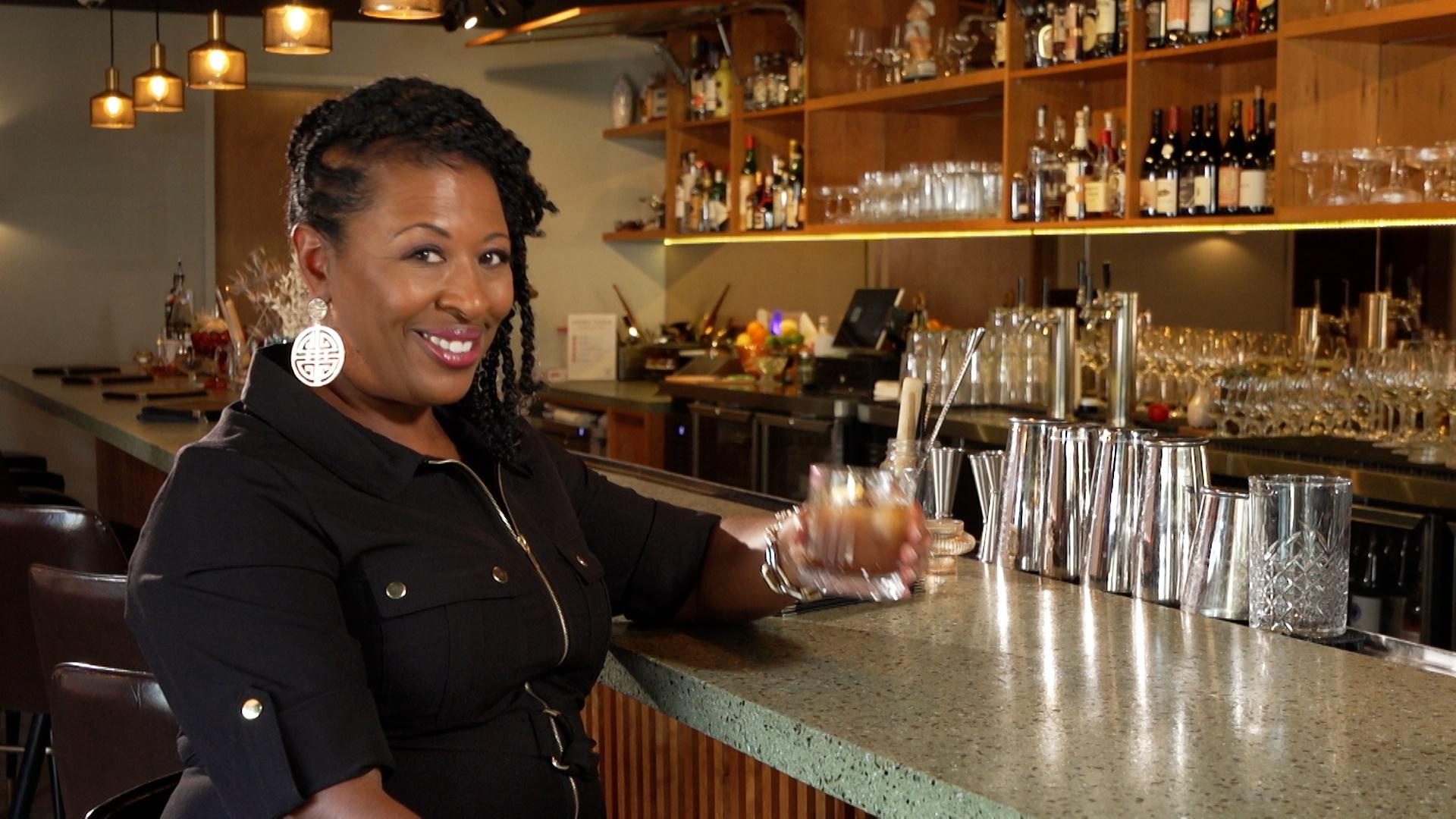 Host of NC Weekend Deborah Holt Noel at the bar inside of Longleaf Hotel.