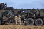 U.S. holds talks as tensions over Russia mount