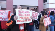 Public workers keep up protests over rise in health premiums