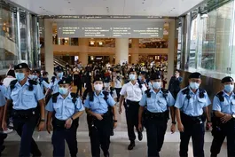 Hong Kong residents worry immigration law may ban their exit