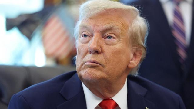 News Wrap: Trump signs order aimed at flag burning