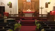 Governor clears way for parking lot religious services