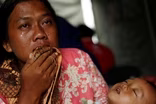 News Wrap: Tsunami death toll climbs to 429