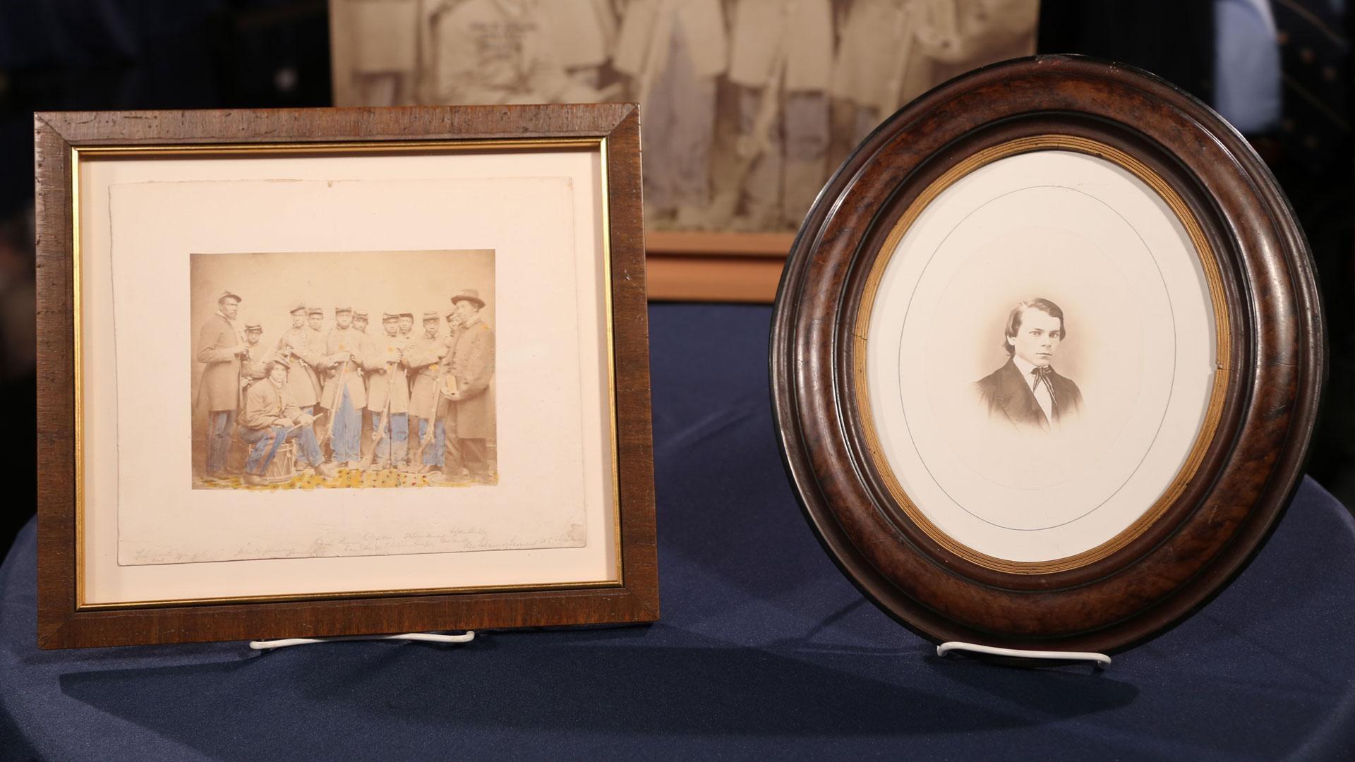Barbie doll; Afghan rug; historic photo of soldiers; Joe Montana rookie card; rare cognac.