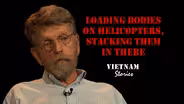 Loading Bodies On Helicopters, Stacking Them In There