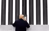 News Wrap: Trump touts border wall in visit to Texas