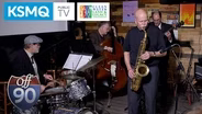 Inflatable planetarium, frogs, artworks, saxophone player