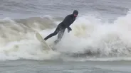 Surfers on Lake Michigan Battle High Waves, Heavy Winds