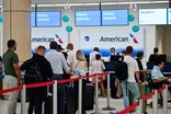 News Wrap: American Airlines temporarily grounds flights