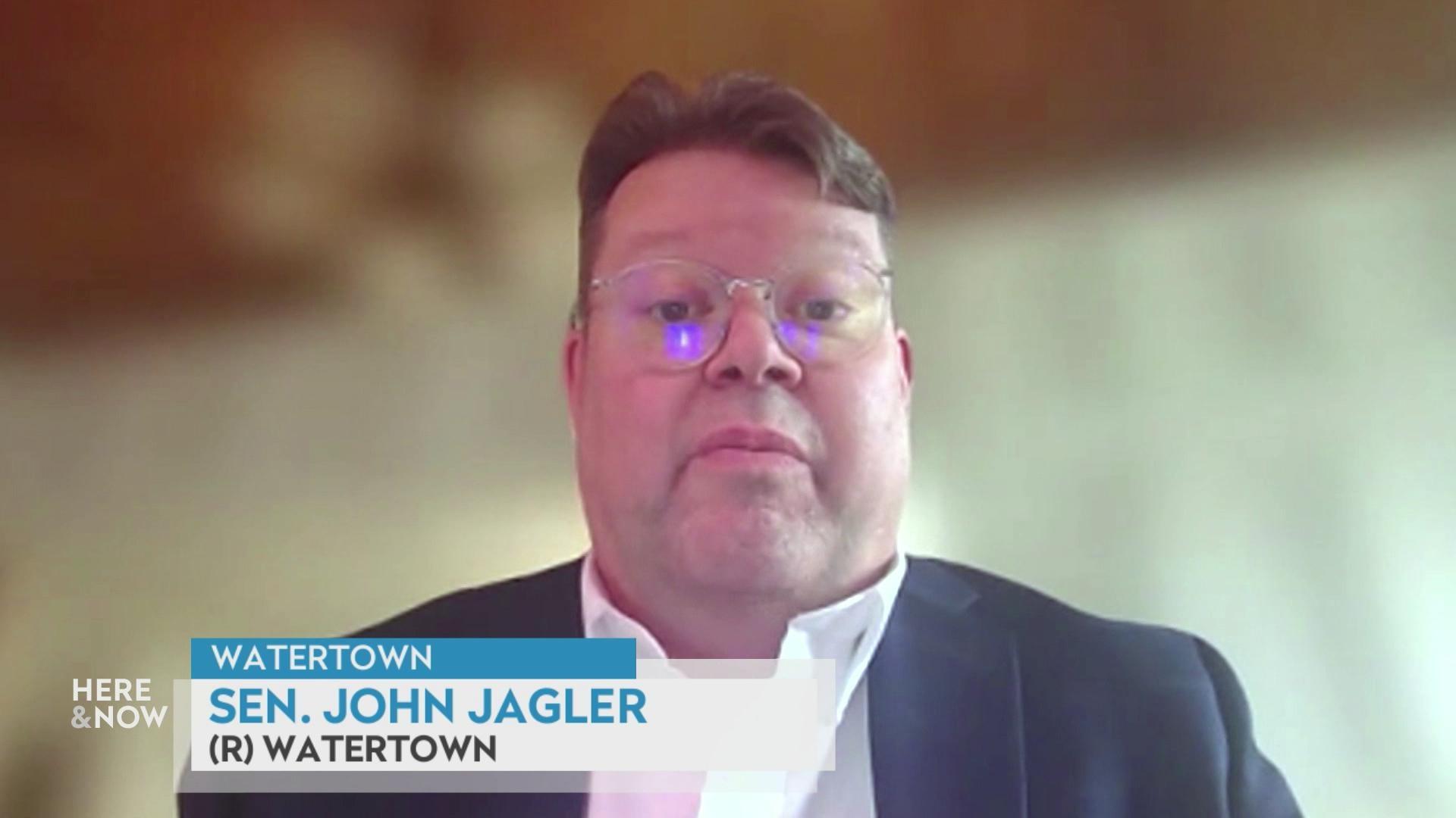 A still image from a video shows John Jagler seated in front of a blurred background, with a graphic at bottom reading 'Watertown,' 'Sen. John Jagler' and '(R) Watertown.'