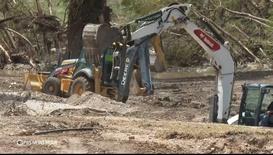 Crews peel away layers of flood debris in search for missing: asset-mezzanine-16x9