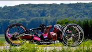 Paralyzed by polio, triathlete still crosses the finish line