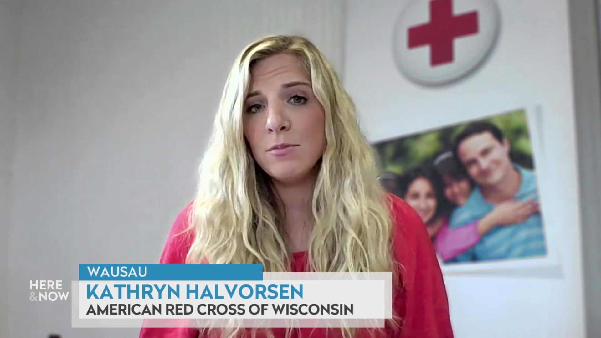 A still image shows Kathryn Halvorsen seated in front of a photo of a family, with a graphic in the bottom that reads 'Wausau,' 'Kathryn Halvorsen' and 'American Red Cross of Wisconsin.'