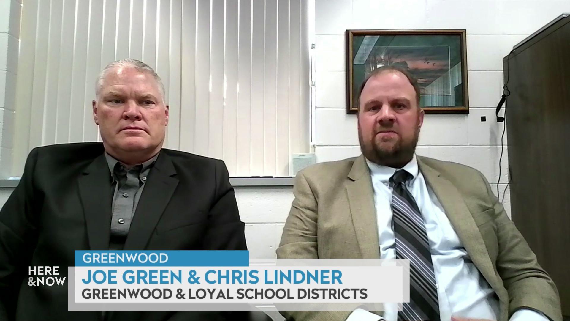 A still image shows Joe Green and Chris Lindner seated in an office with a graphic at the bottom that reads 'Greenwood,' 'Joe Green & Chris Lindner' and ' Greenwood & Loyal School Districts.'